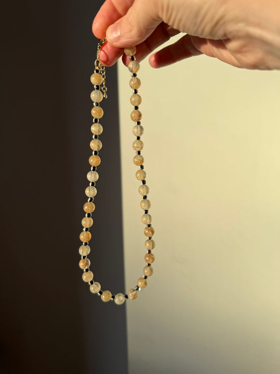 Yellow Citrine Stone w/ half transparent black glass spacer