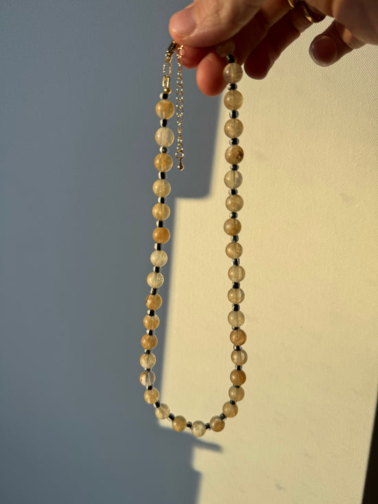 Yellow Citrine Stone w/ half transparent black glass spacer